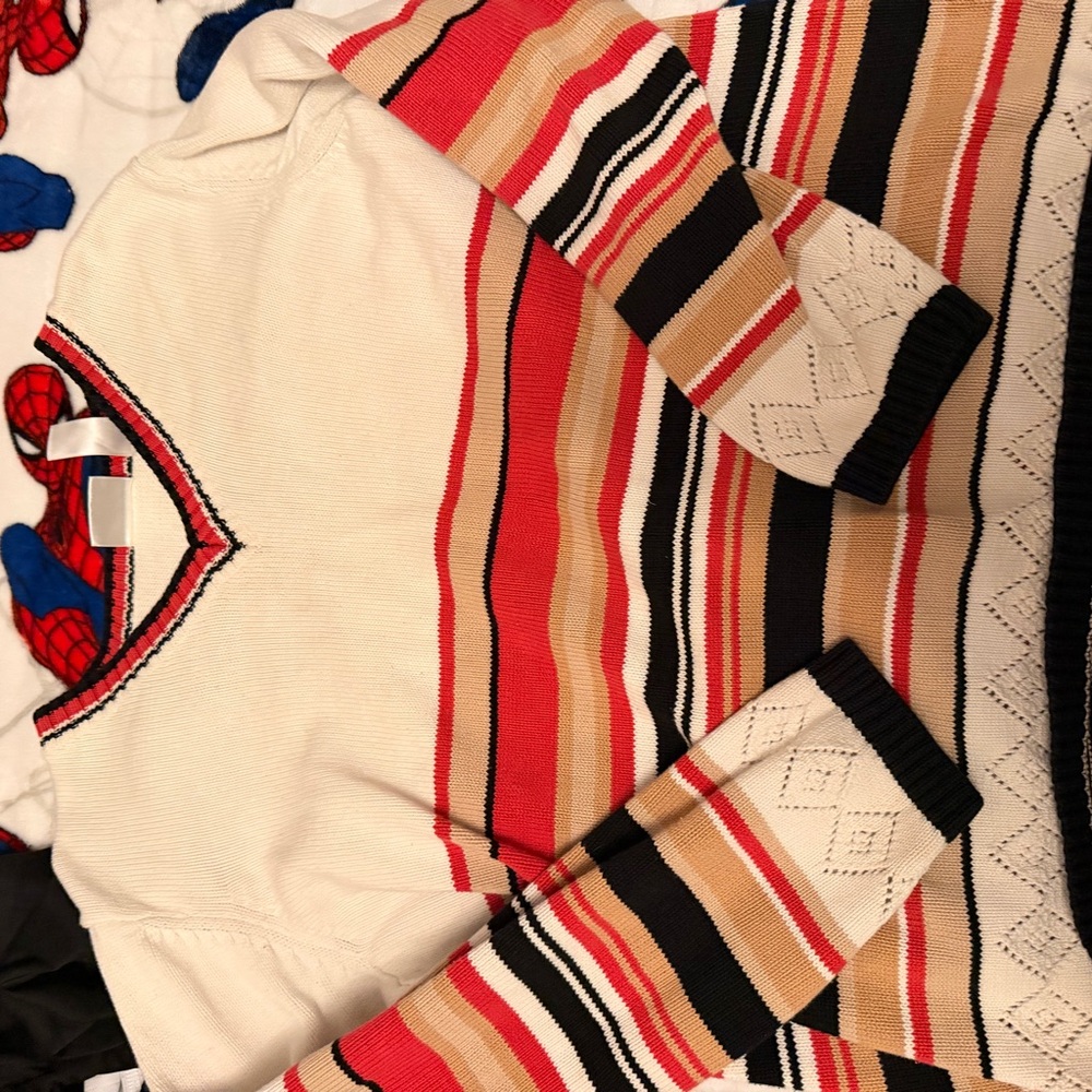 villager Cream Sweater with Red, Black & Blue Stripe Trim